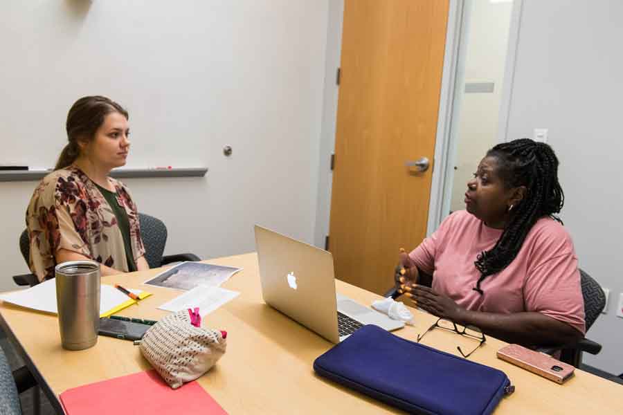 A patient working with a TWU student in the stroke center.	