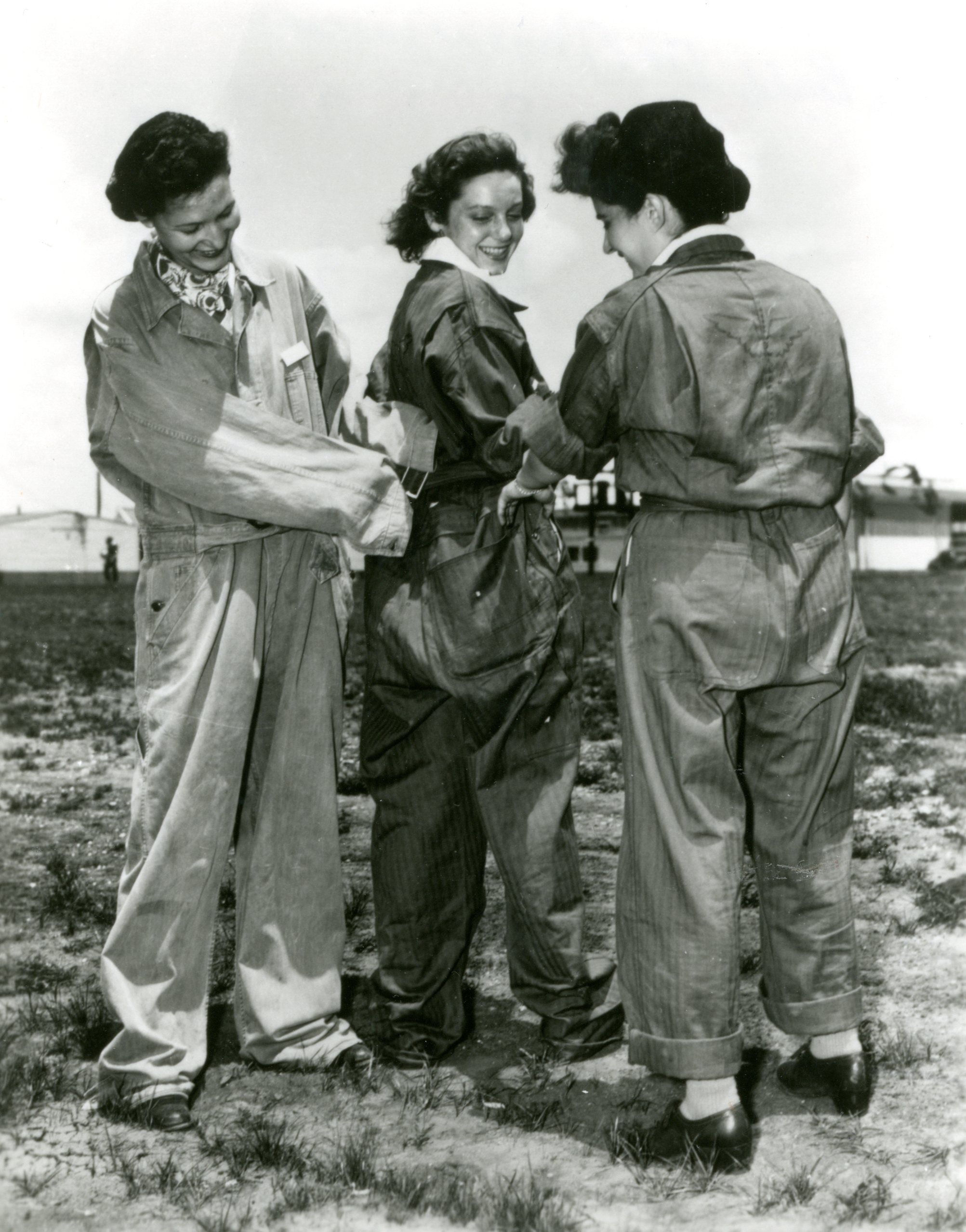 WASP wearing oversized overalls