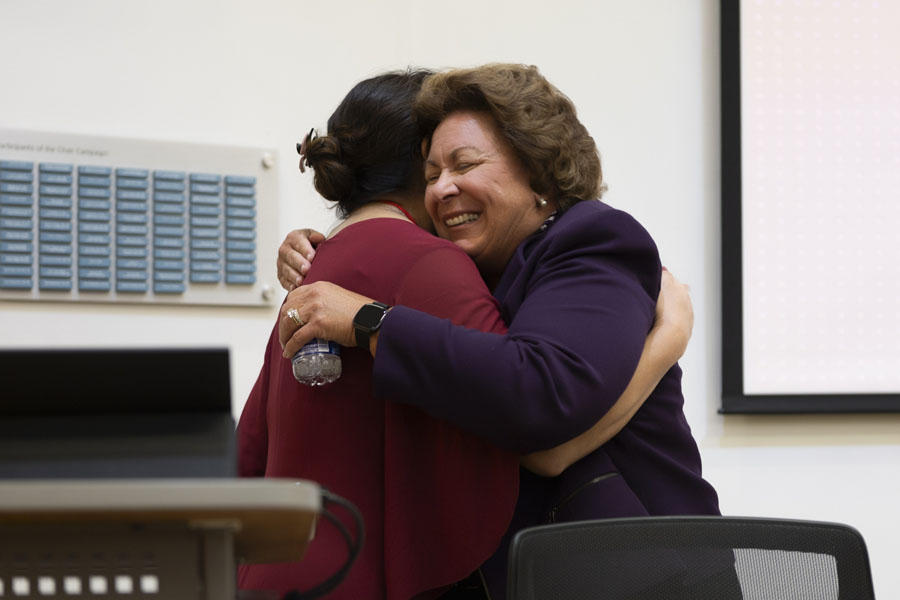 Keynote speaker Judy Murphy and conference director Mikyoung Lee embrace