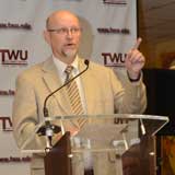 Dr. Miller addressing the crowd at the dedication ceremony